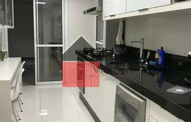 Imagem: O apartamento possui 4 Dormitórios, 5 Banheiros, 2 Vagas na