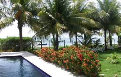 Imagem: A casa possui 5 Dormitórios, 5 Banheiros, 5 Vagas na garagem