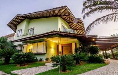 Imagem: A casa possui 3 Dormitórios, 2 Banheiros, 2 Vagas na garagem