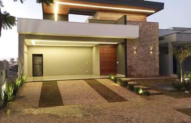 Imagem: A casa possui 3 Dormitórios, 5 Banheiros, 4 Vagas na garagem