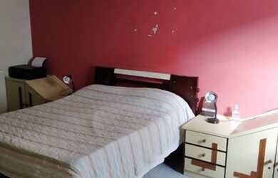 Imagem: A casa possui 3 Dormitórios, 3 Banheiros, 3 Vagas na garagem