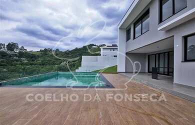 Imagem: A casa em condomínio possui 4 Dormitórios, 5 Banheiros, 2