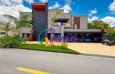 Imagem: A casa em condomínio possui 5 Dormitórios, 5 Banheiros, 5