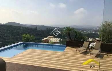 Imagem: A casa possui 5 Dormitórios, 5 Banheiros, 5 Vagas na garagem