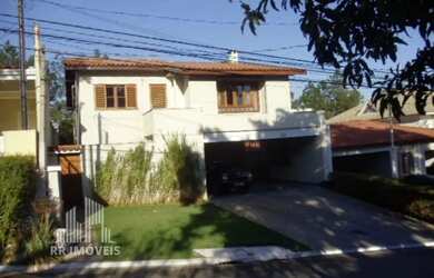 Imagem: A casa em condomínio e possui 3 Dormitórios, 3 Banheiros