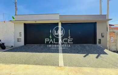 Imagem: A casa possui 2 Dormitórios, 1 Banheiro, 2 Vagas na garagem