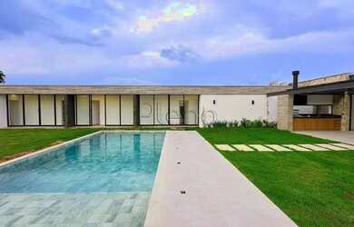 Imagem: A casa em condomínio possui 5 Dormitórios, 5 Banheiros, 5