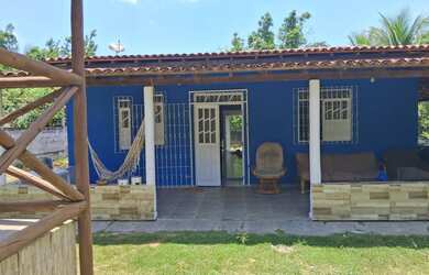 Imagem: A casa possui 3 Dormitórios, 3 Banheiros, 5 Vagas na garagem