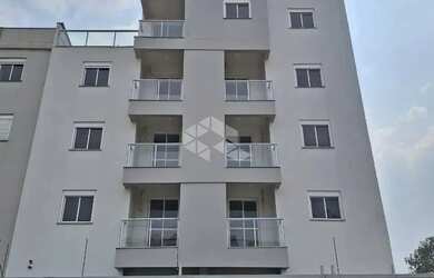 Imagem: O apartamento possui 2 Dormitórios, 1 Banheiro, 2 Vagas na