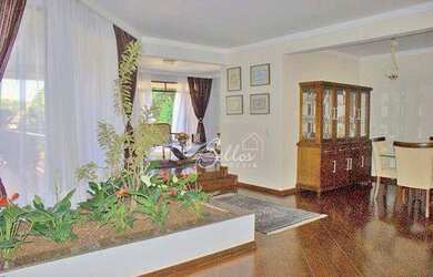 Imagem: A casa em condomínio possui 4 Dormitórios, 5 Banheiros, 4