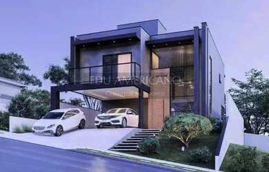 Imagem: A casa possui 3 Dormitórios, 4 Banheiros, 2 Vagas na garagem