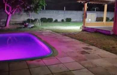 Imagem: A casa possui 3 Dormitórios, 4 Banheiros e 5 Vagas na garagem