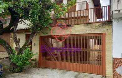 Imagem: A casa possui 3 Dormitórios, 3 Banheiros, 2 Vagas na garagem