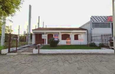 Imagem: A casa possui 3 Dormitórios, 2 Banheiros, 130m² de Área e