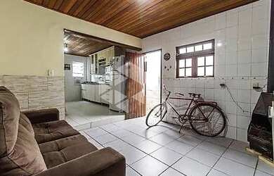 Imagem: A casa possui 3 Dormitórios, 3 Banheiros, 89m² de Área e