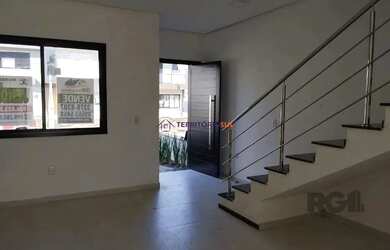 Imagem 2: Casa em Hípica. Churrasqueira, Lareira, 1 Vaga na garageme3 Dormitórios