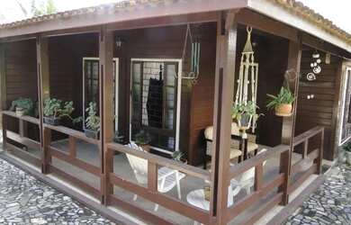 Imagem: A casa possui 5 Dormitórios, 5 Banheiros, 5 Vagas na garagem