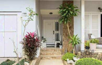 Imagem: A casa possui 3 Dormitórios, 3 Banheiros, 3 Vagas na garagem