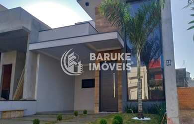 Imagem: A casa possui 3 Dormitórios, 2 Banheiros, 2 Vagas na garagem