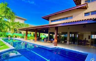 Imagem: A casa em condomínio possui 5 Dormitórios, 5 Banheiros, 5