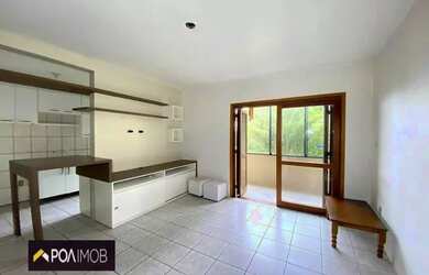 Imagem: O apartamento possui 1 Dormitório, 1 Banheiro, 1 Vaga na garagem