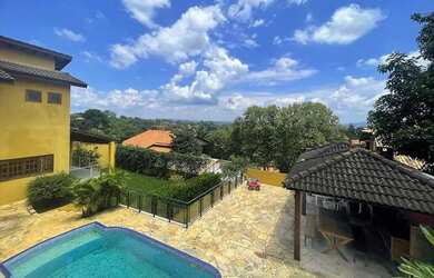 Imagem: A casa em condomínio à venda possui 4 Dormitórios, 5 Banheiros