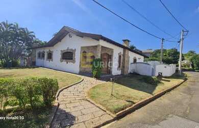 Imagem: A casa possui 3 Dormitórios, 3 Banheiros, 3 Vagas na garagem