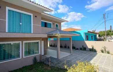 Imagem: A casa possui 3 Dormitórios, 2 Banheiros, 3 Vagas na garagem