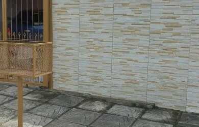 Imagem: A casa possui 2 Dormitórios, 2 Banheiros, 1 Vaga na garagem