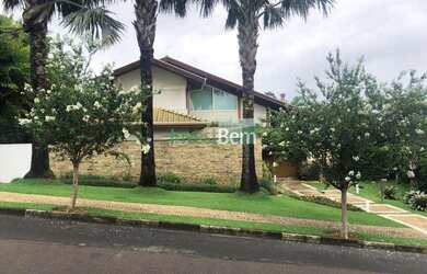 Imagem: A casa possui 4 Dormitórios, 5 Banheiros, 3 Vagas na garagem