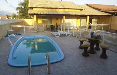 Imagem: A casa possui 2 Dormitórios, 3 Banheiros e está localizado