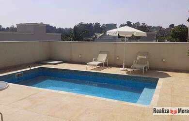 Imagem: A casa em condomínio possui 3 Dormitórios, 3 Banheiros, 3