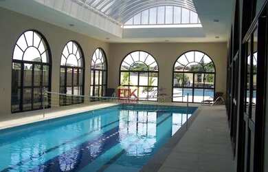 Imagem: O apartamento possui 4 Dormitórios, 2 Banheiros, 2 Vagas na