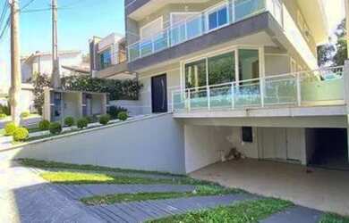 Imagem: A casa em condomínio possui 4 Dormitórios, 5 Banheiros, 4