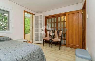 Imagem 11: Apartamento de 113m2, living em 3 ambientes cercado por jardim de inverno