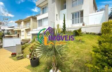 Imagem: A casa em condomínio possui 4 Dormitórios, 5 Banheiros, 5