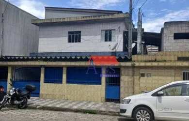 Imagem: A casa possui 3 Dormitórios, 1 Banheiro, 2 Vagas na garagem