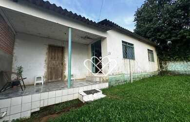 Imagem: A casa possui 3 Dormitórios, 1 Banheiro, 1 Vaga na garagem