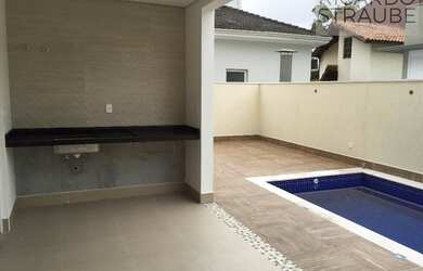 Imagem: A casa em condomínio possui 3 Dormitórios, 5 Banheiros, 4