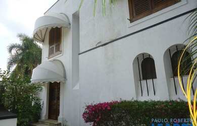 Imagem: A casa em condomínio possui 4 Dormitórios, 5 Banheiros, 5