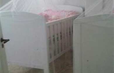 Imagem: A casa possui 3 Dormitórios, 2 Banheiros, 4 Vagas na garagem