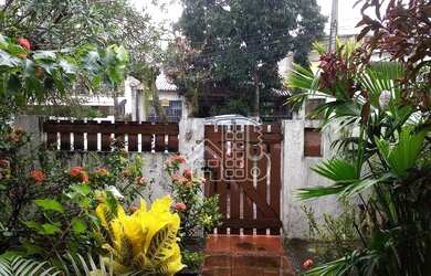 Imagem: A casa possui 5 Dormitórios, 4 Banheiros, 2 Vagas na garagem