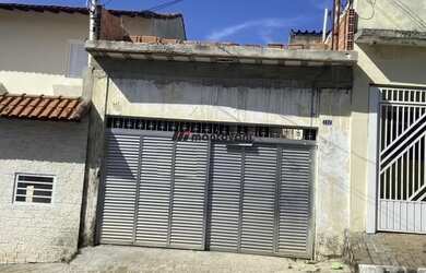 Imagem: A casa possui 3 Dormitórios, 1 Banheiro, 2 Vagas na garagem