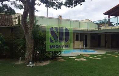 Imagem: A casa possui 3 Dormitórios, 2 Banheiros, 3 Vagas na garagem