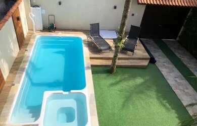 Imagem: A casa possui 3 Dormitórios, 2 Banheiros, 2 Vagas na garagem