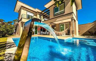 Imagem: A casa em condomínio possui 3 Dormitórios, 4 Banheiros, 4