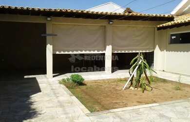 Imagem: A casa possui 3 Dormitórios, 4 Banheiros, 4 Vagas na garagem