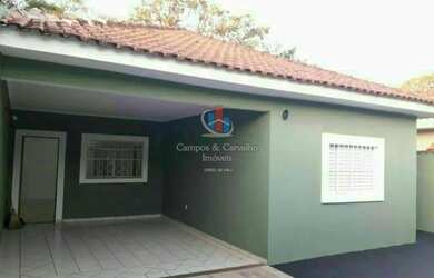 Imagem: A casa possui 3 Dormitórios, 2 Banheiros, 3 Vagas na garagem