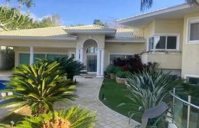 Imagem: A casa possui 5 Dormitórios, 5 Banheiros, 5 Vagas na garagem