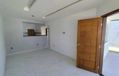 Imagem: A casa possui 3 Dormitórios, 2 Banheiros, 3 Vagas na garagem